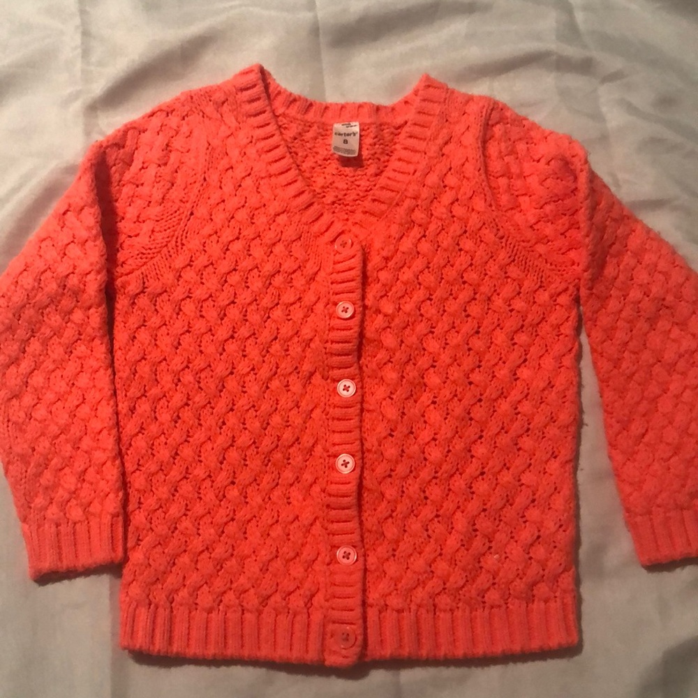 Neon orange knot sweater